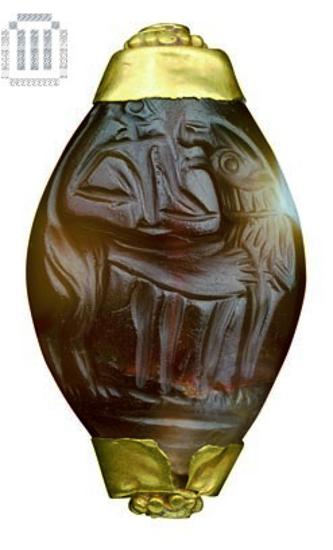 Perforated agate seal stone with golden ends