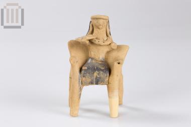 Figurine of a seated female figure