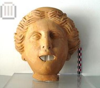 Clay bust of a female figure