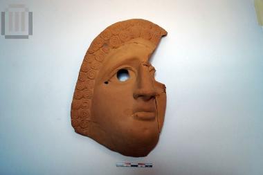 Fragment of clay mask