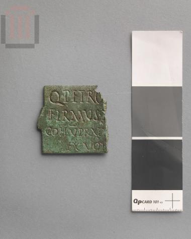 Part of inscripted plaque