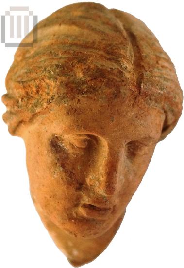 Clay female figurine head
