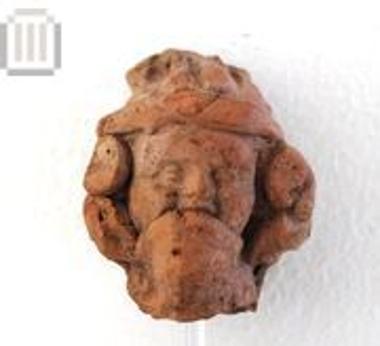 Clay girl figurine head with coif