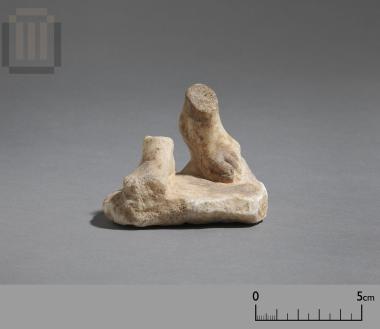 Feet of a small marble statue of Artemis (?) with part of the inherent plinth
