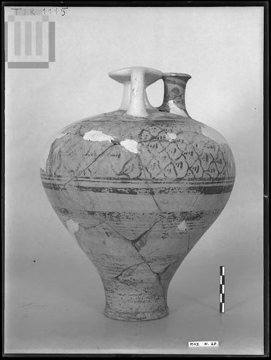 Piriform stirrup jar