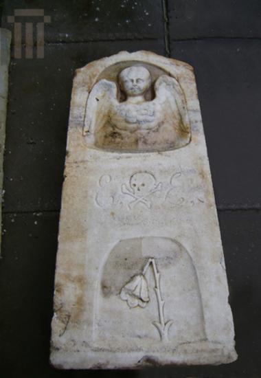 Relief grave stele with inscription
