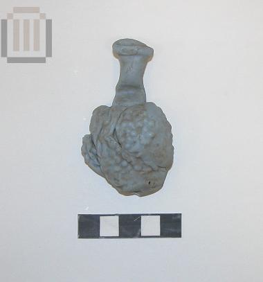 Glass unguentarium in the form of a grape