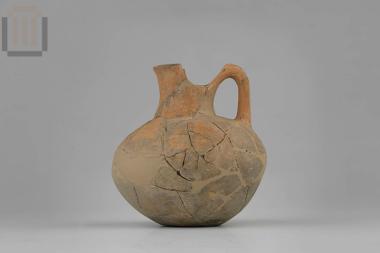 Clay jug with cutaway neck