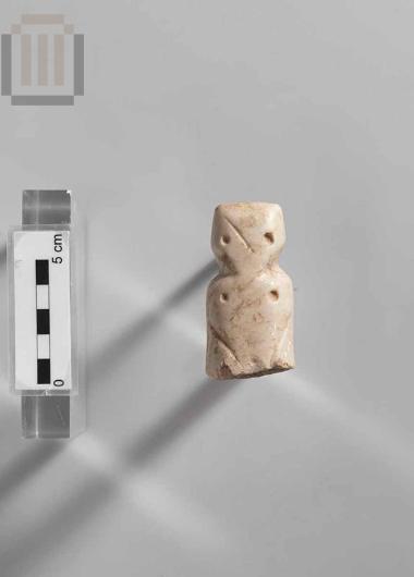 Marble figurine in human shape