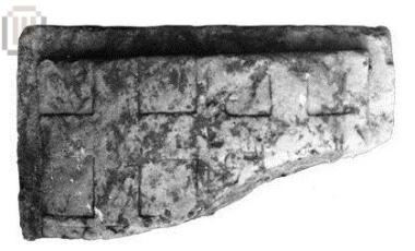 Upper part of a heraldic wall slab with the arms of Pierre d' Aubusson quartering the Order