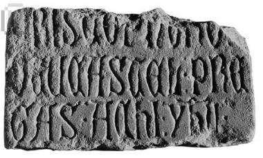 Part of a plaque with incised inscription