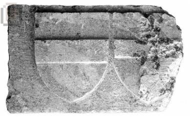 Heraldic wall slab with the arms of a. Grand Master Fluvian and b. the Order