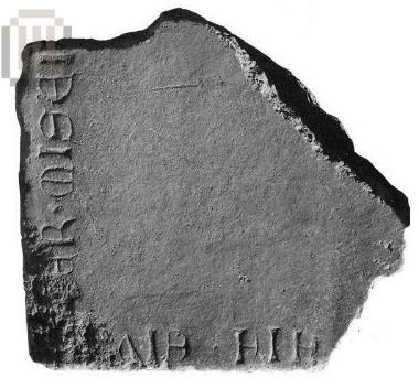 Part of an inscribed tomb slab