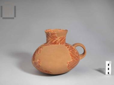 Clay jug with 'scraped' decoration