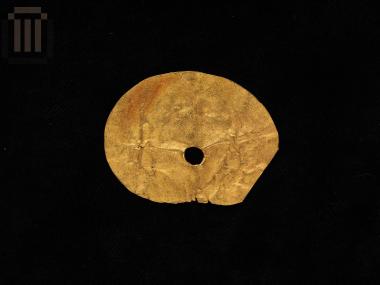 Gold circular sheet with one hole (attached sheet?)