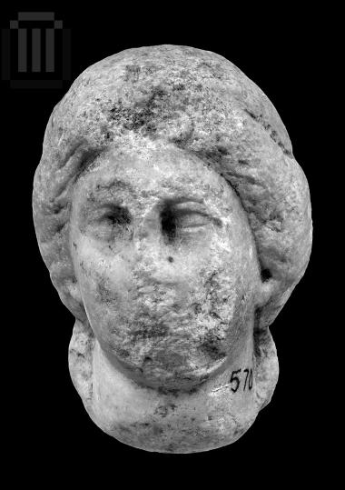 Head of female statuette