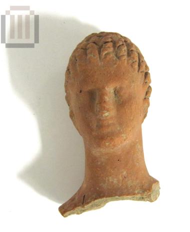 Head from a terracotta figurine of a female figure