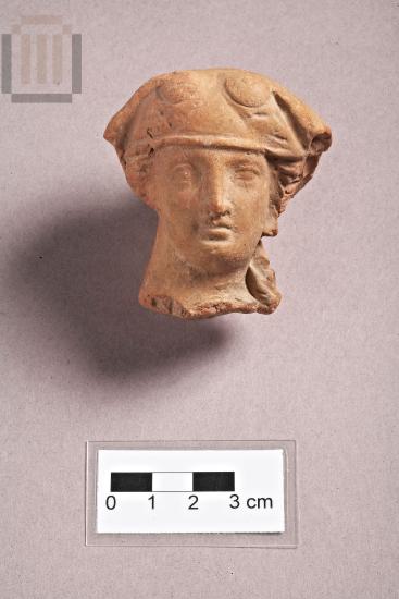 Head from a terracotta figurine of a female figure