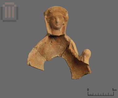 Part of a female terracotta figurine
