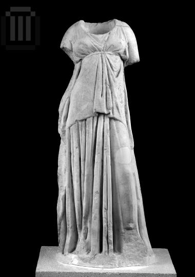 Headless statuette of female figure