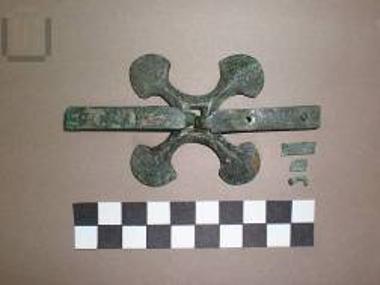 Bronze X-shaped accessory of horse equipment