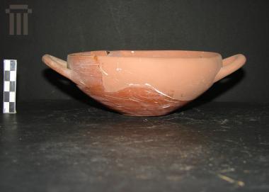 Red-glazed footless thin-walled cup (kylix) of a local workshop