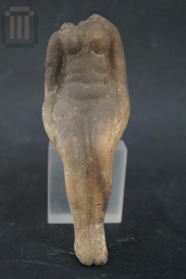 Headless seated female figurine