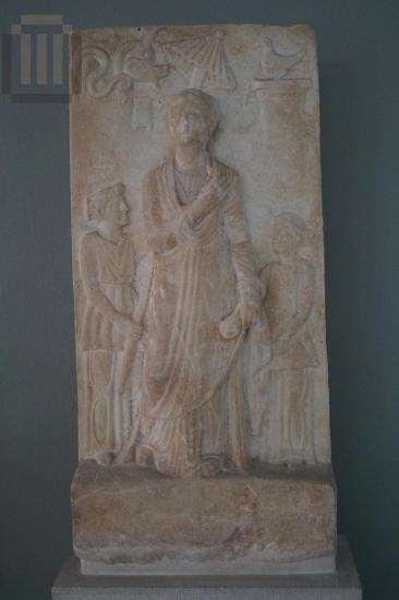 Relief with female figure standing