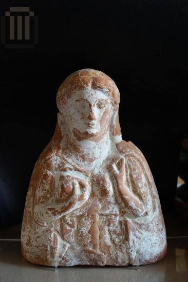 Clay bust of a female figure