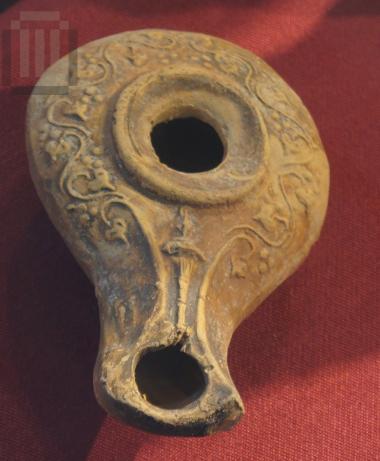 Lamp with relief decoration