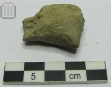 Upper part of the body of a figurine