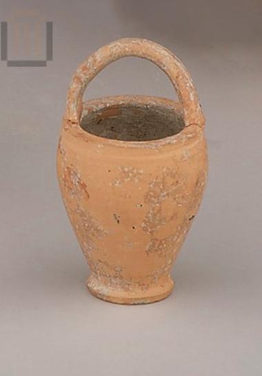 Small tin-foiled clay bell situla