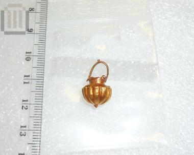 Gold situla shaped pendant