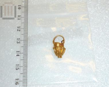 Gold situla shaped pendant