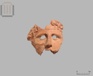 Part of a terracotta theatrical mask