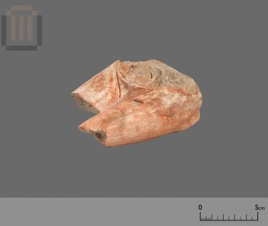 Part of a big seated terracotta figurine of a female figure