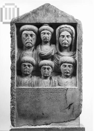Inscribed marble relief funerary stele with six busts