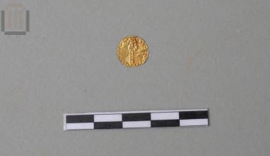 Χρυσή δανάκη με κηρύκειο