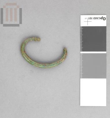 Bronze handle of a cauldron (?)