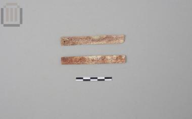 Two bone parts from the veneering of a wooden comb