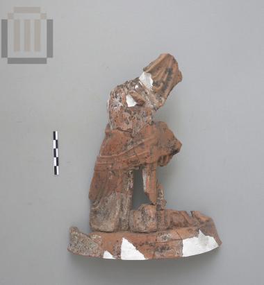 Τμήμα πήλινου ειδωλίου γυναικείας μορφής