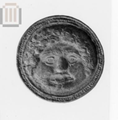 Clay disc with relief Gorgo head