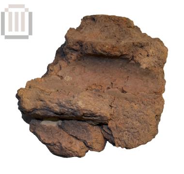 Part of a clay brick or coating