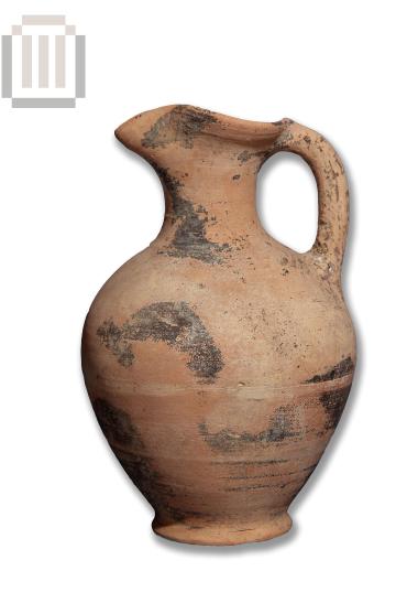 Protogeometric trefoil-mouthed jug from the Oikonomou Collection.
