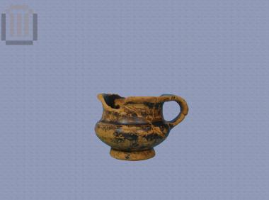 Black-glazed kalyx-shaped cup from Orraon