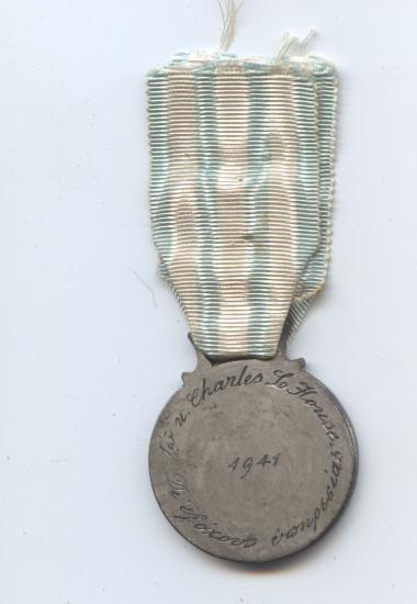Μετάλλιο του Ελληνικού Ερυθρού Σταυρού με το οποίο βραβεύτηκε ο Charles Lucious House, 1941(πίσω όψη)