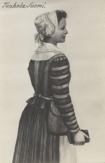 Woman wearing traditional clothes, unidentified