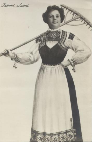Woman wearing traditional clothes, unidentified