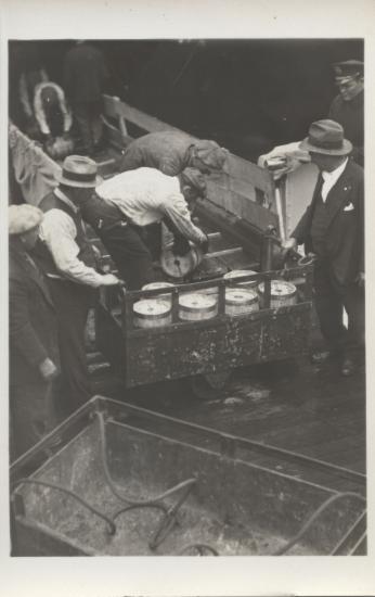 People carrying kegs, probably in the United States