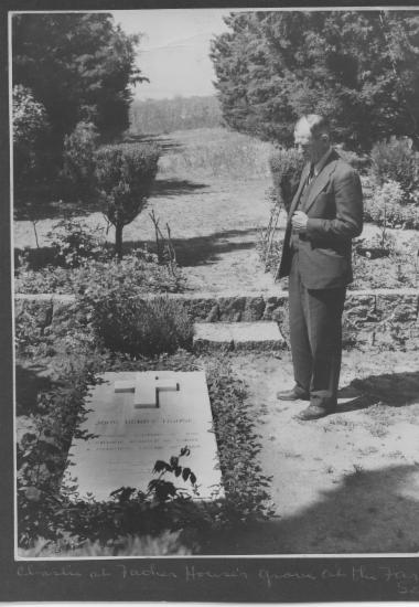Scrapbook memorial photo of Charles Lucius House infront of Father House grave at the Farm School, 8